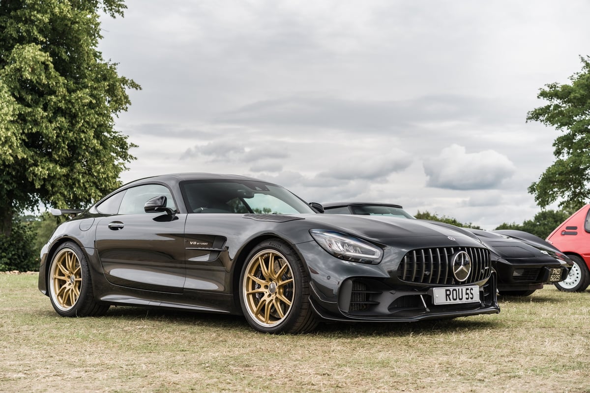 A dark gray Mercedes AMG GT R displayed at the Tarporley Car Show.